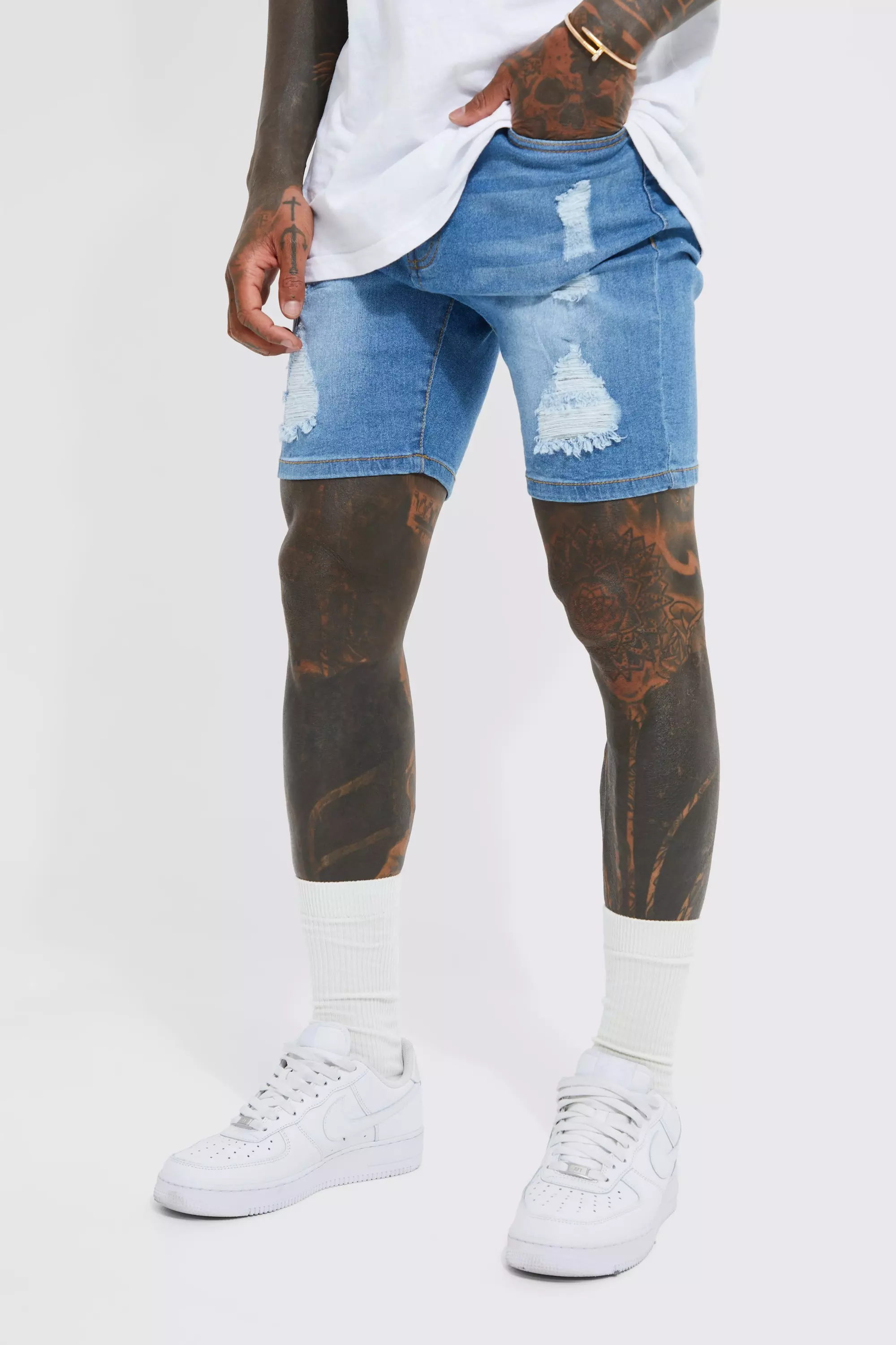 Stretch distressed store denim shorts